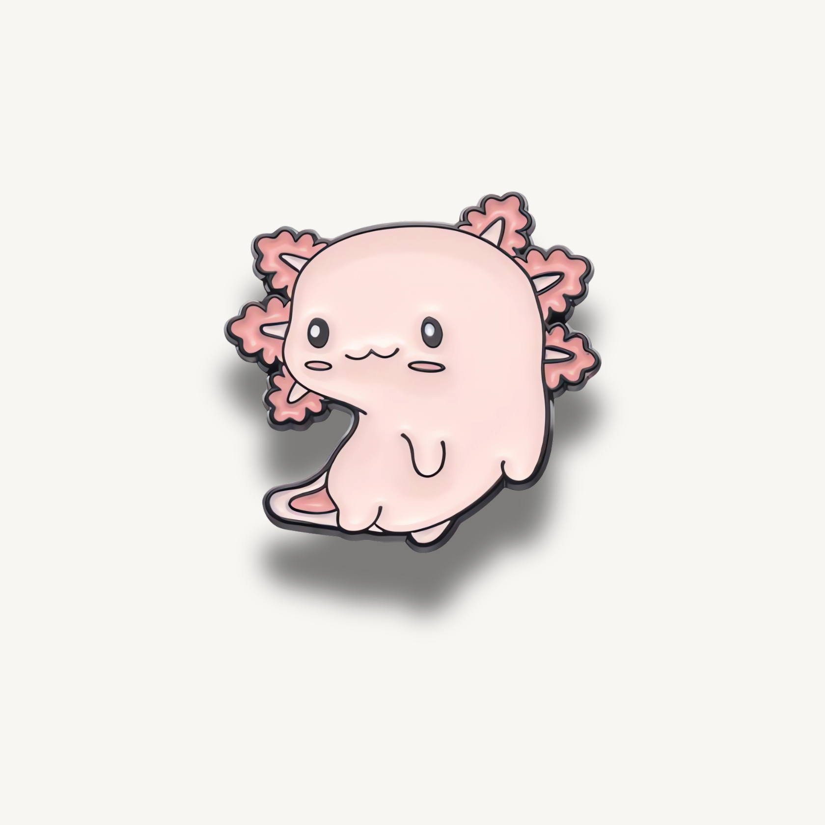 Smaltovaná brošňa ružového axolotla s čiernymi kontúrami a úsmevom.