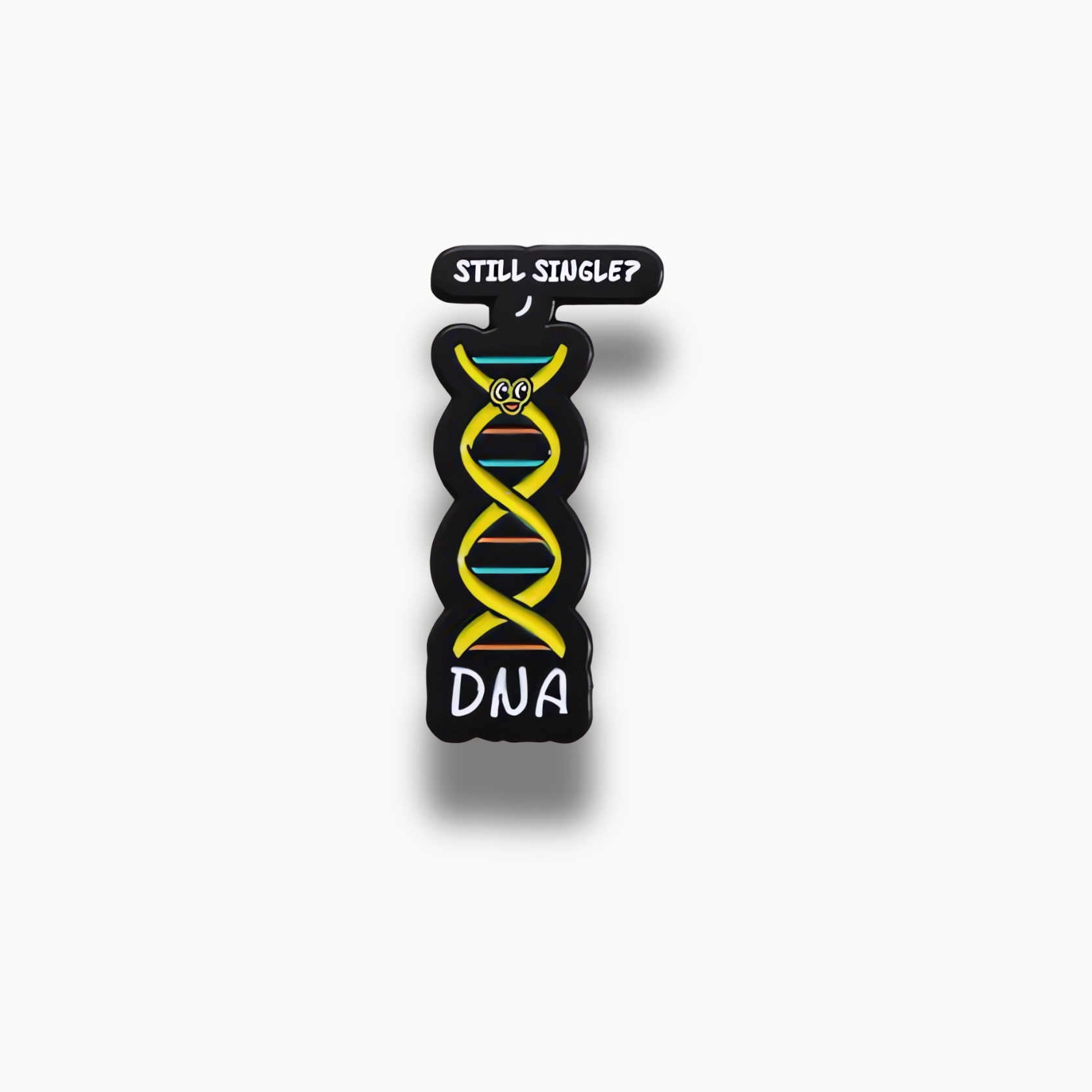 Čierna brošňa s motívom DNA, s kreslenou tvárou a nápisom Still Single?.
