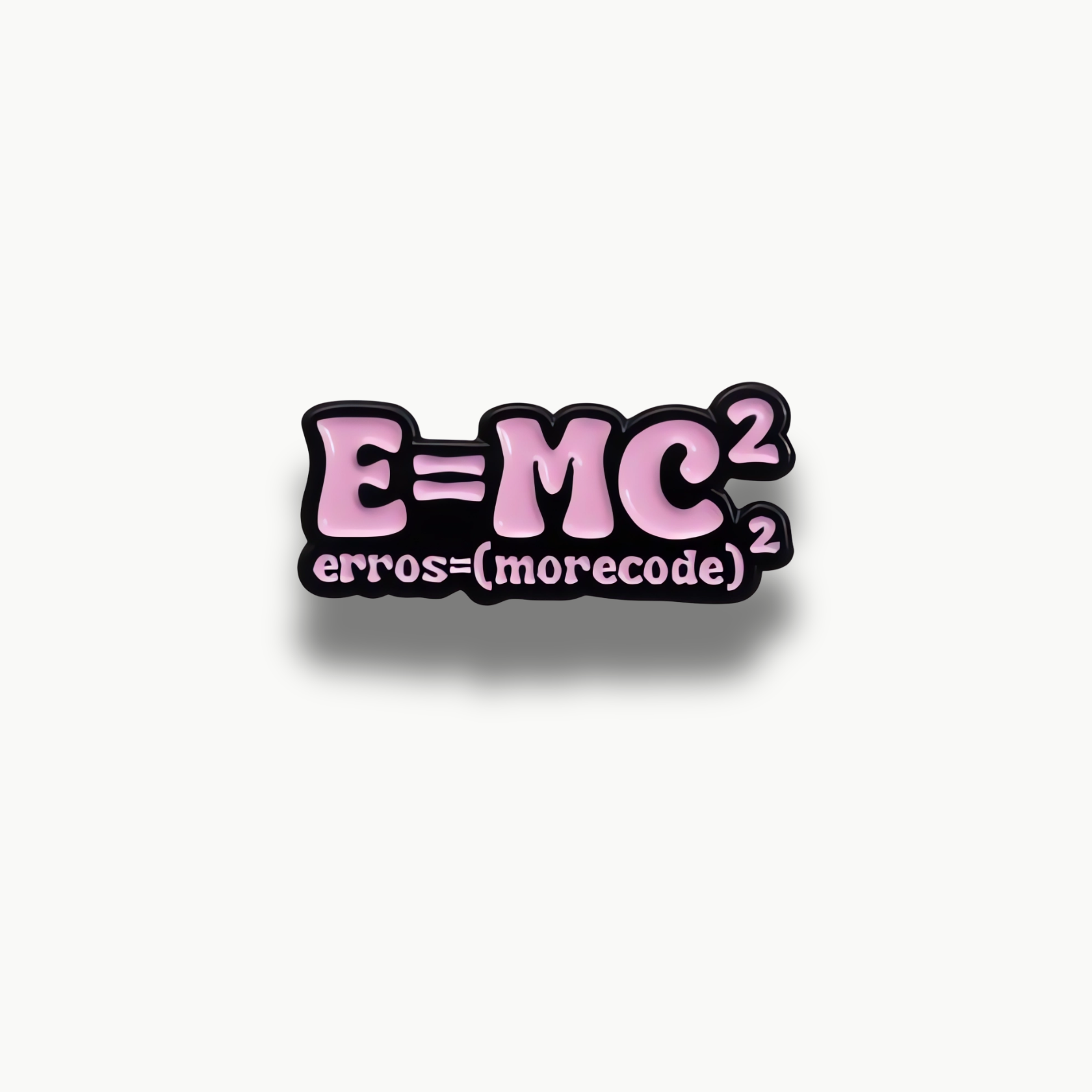 Smaltovaná brošňa s ružovou formulou E=MC² a textom 'erros=(morecode)²' na čiernom podklade.